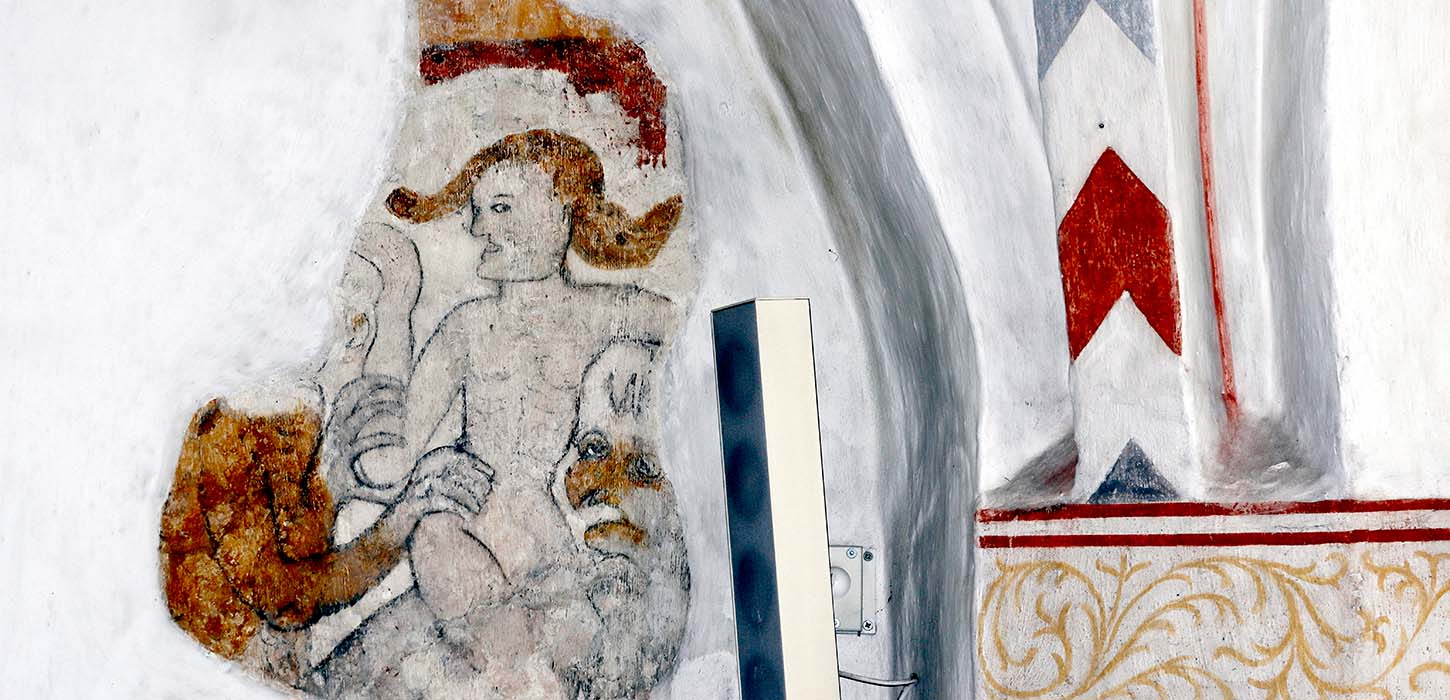 Jomfruen fra Rygaard hænger i dag til skræk og advarsel på kirkevæggen i Langå..