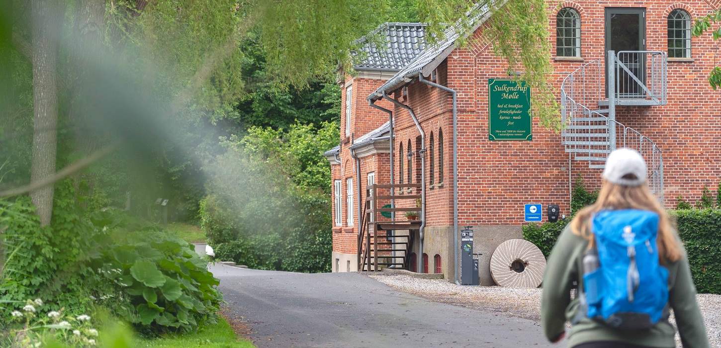 Hiker take a walk at the scenic Sulkendrup Mill