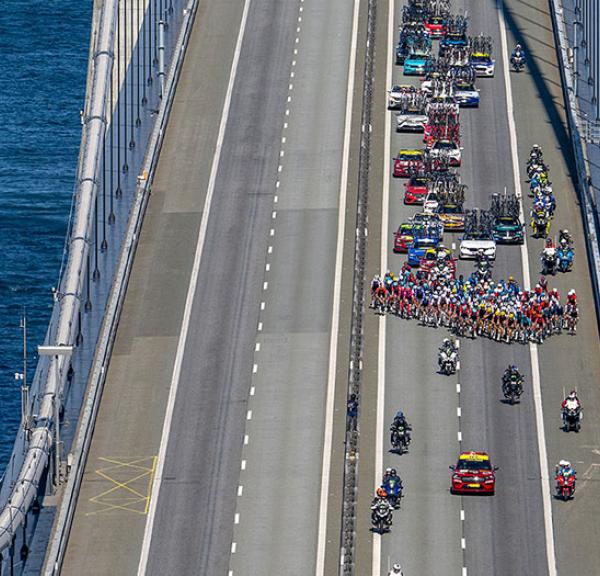 The riders crossing the Great Belt Bridge